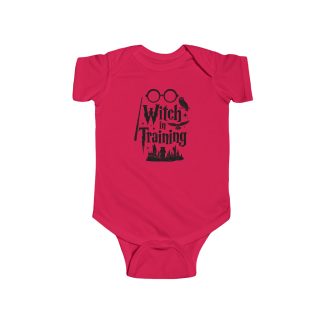 A red baby onesie with the text "Witch in Training" printed in a playful black font across the front. The onesie features short sleeves and snaps at the bottom for easy changing. The design includes a small, whimsical witch hat above the text, adding a fun, magical touch to the overall look. Perfect for Halloween or any little one who's destined to charm with their budding magical skills!