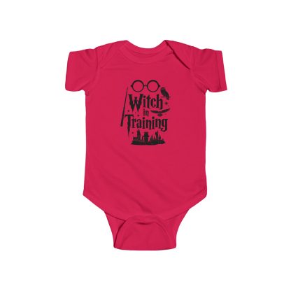 A red baby onesie with the text "Witch in Training" printed in a playful black font across the front. The onesie features short sleeves and snaps at the bottom for easy changing. The design includes a small, whimsical witch hat above the text, adding a fun, magical touch to the overall look. Perfect for Halloween or any little one who's destined to charm with their budding magical skills!