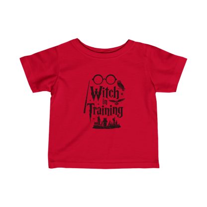 Toddler t-shirt with 'Witch in Training' printed in whimsical white font, designed for young wizarding fans. Perfect for magical adventures and everyday wear.