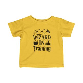 Baby wearing a soft, white 'Wizard in Training' t-shirt, with a magical wand design. The tee is made of 100% combed, ring-spun cotton, featuring a comfortable fit with taped shoulders and ribbed knitting for durability