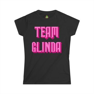 Women's softstyle t-shirt with "Team Glinda" graphic printed on the front, featuring a semi-fitted design, short sleeves, and a crew neckline. The shirt is made from 100% ringspun cotton, with a soft, lightweight fabric and reinforced collar for durability. The design embodies a feminine take on the classic t-shirt style.