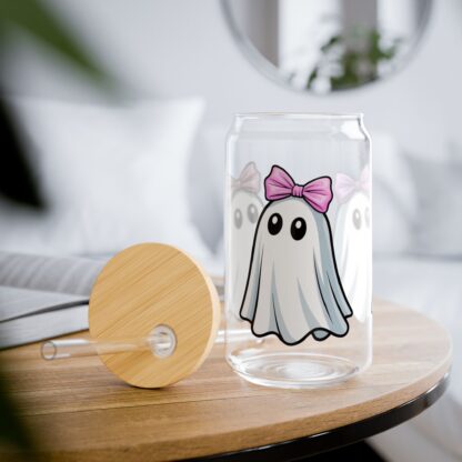 Cute ghost in a white sheet wearing pink bow on a 16oz sipper glass.
