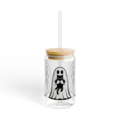 Cute ghost in a white sheet showing off his grumpy black cat on a 16oz sipper glass.