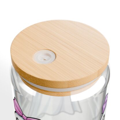 Cute ghost in a white sheet wearing pink bow on a 16oz sipper glass.
