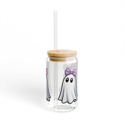 Cute ghost in a white sheet wearing pink bow on a 16oz sipper glass.