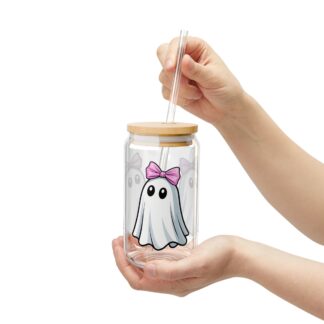 Cute ghost in a white sheet wearing pink bow on a 16oz sipper glass.