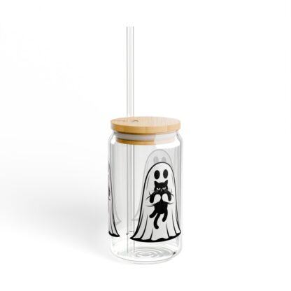 Cute ghost in a white sheet showing off his grumpy black cat on a 16oz sipper glass.